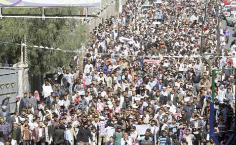 Anti-Houthi protesters take part during a rally in Sanaa on Saturday.