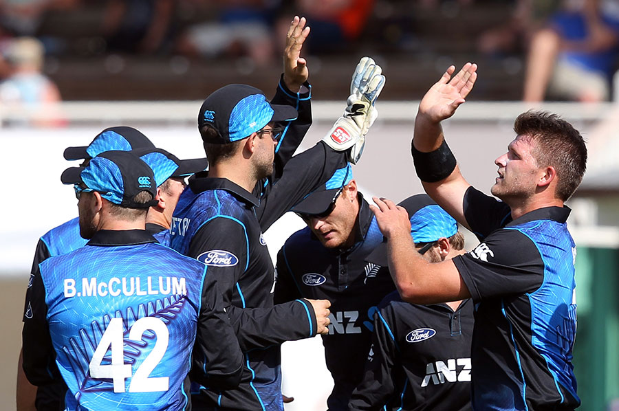 Corey Anderson celebrates the wicket of Dimuth Karunaratne with his team-mates during the 6th ODI between New Zealand and Sri Lanka at Dunedin on Sunday.