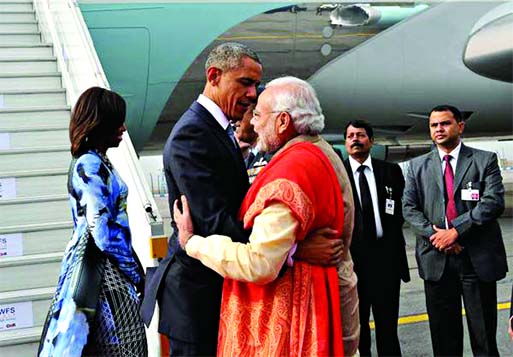 US President Barack Obama hugs India's Prime Minister Narendra Modi as he arrives at Air Force Station Palam in New Delhi on Sunday. Photo: Internet