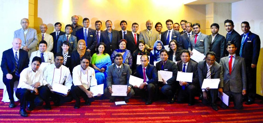 Dhaka Regency Hotel, participated in a daylong workshop on "Customer Focused Service Excellence", organized jointly by ILO B-SEP Project and Labour Ministry, pose with their certificates at a city hotel recently.