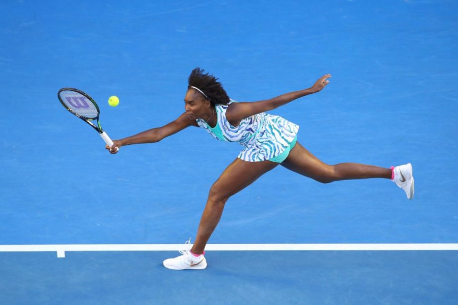 Venus Williams of the United States plays a forehand in her fourth round match against Agnieszka Radwanska of Poland during day eight of the 2015 Australian Open at Melbourne Park on Monday in Melbourne, Australia.