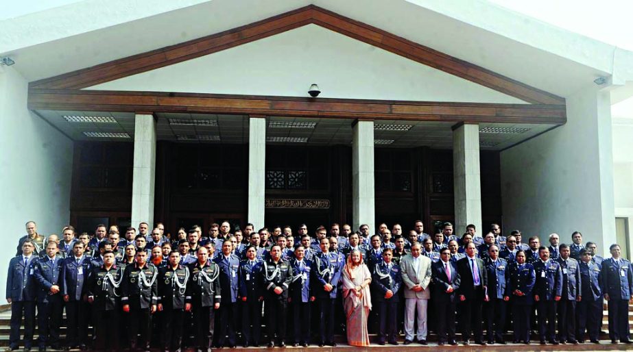 Prime Minister Sheikh Hasina along with high police officials at a photo session at her office on Wednesday on the occasion of Police Week-2015. BSS photo