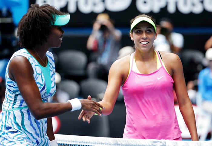 Madison Keys of the U.S. (right) is congratulated by her compatriot Venus Williams at the net after winning their quarterfinal match at the Australian Open tennis championship in Melbourne, Australia on Wednesday.