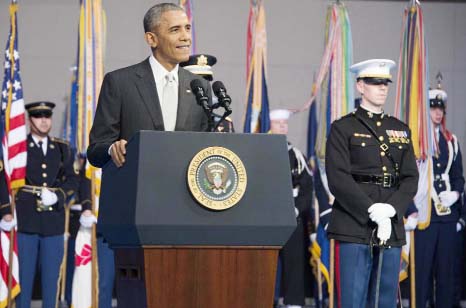 US President Barack Obama delivers remarks at an Armed Forces Farewell Ceremony for departing US Secretary of Defence Chuck Hagel at Joint Base Fort Myer-Henderson in Arlington, Virginia on Wednesday.