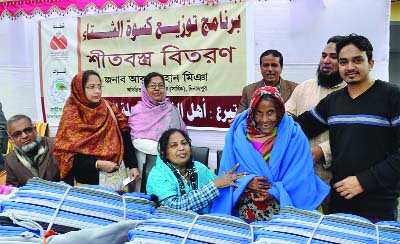 DINAJPUR: Society for Social and Technological Support distributed blankets among cold-hit people in Dinajpur on Wednesday.