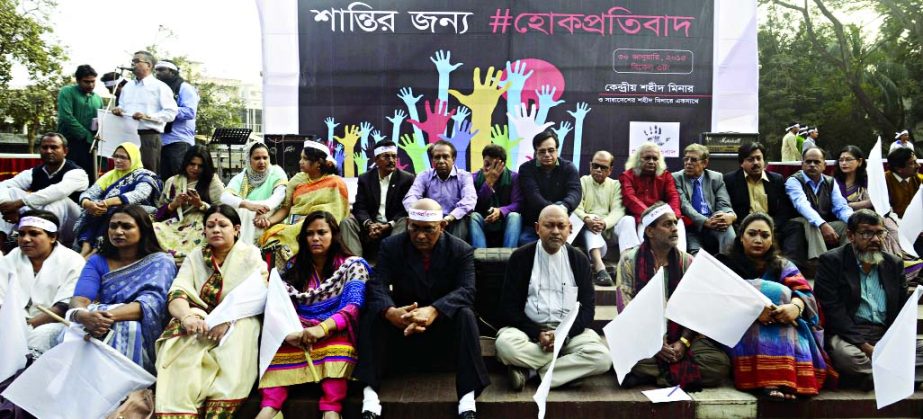 'Hok Protibad' a social organisation holds a peace rally at the Central Shaheed Minar premises in the city on Friday for the greater interest of the people of the country.