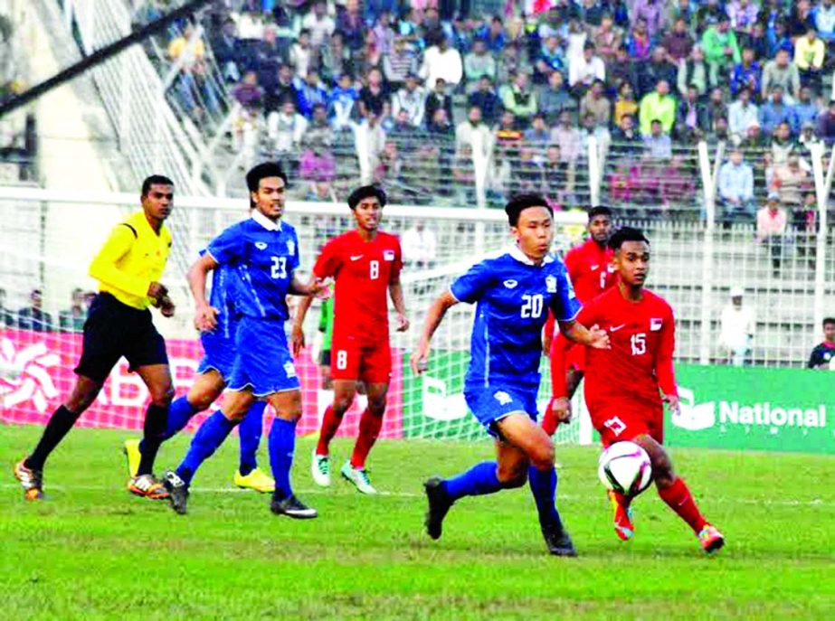 A scene from the match of the Bangabandhu Gold Cup International Football Tournament between Thailand and Singapore at the Sylhet District Stadium on Friday. Thailand won the match 3-2.