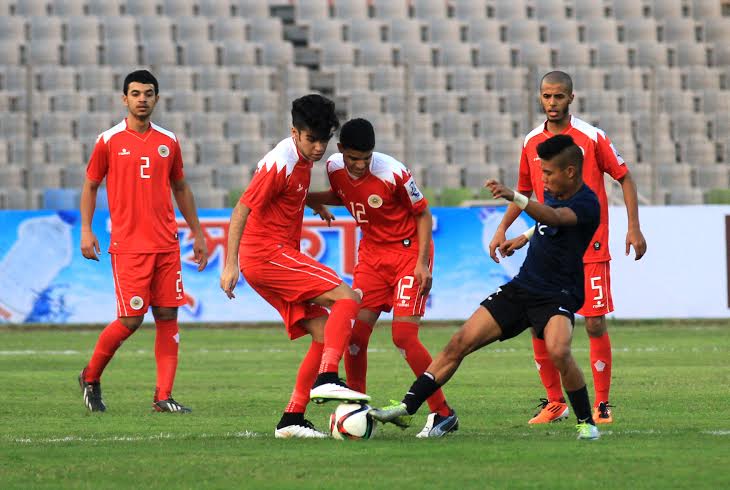 A moment of the match of the Bangabandhu Gold Cup International Football Tournament between Bahrain and Singapore at the Bangabandhu National Stadium on Sunday.