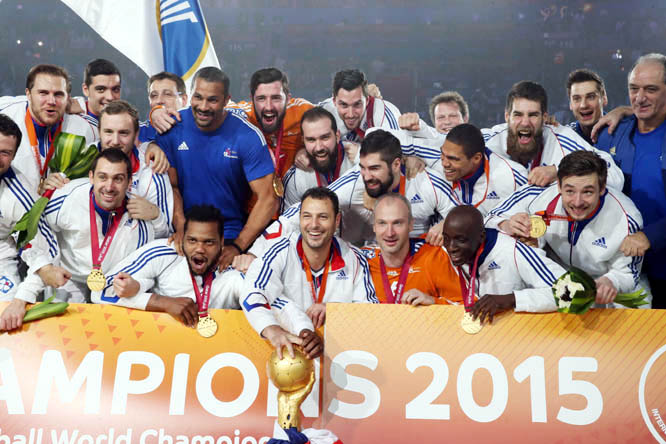 French team players celebrate with the trophy during the podium ceremony of 24th Men's Handball World Championships at the Lusail Multipurpose Hall in Doha, Qatar on Sunday.