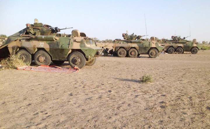 Three armoured vehicles of the Chadian army are pointed in the direction of Gamboru, Nigeria, from a position in Fotokol, Cameroon on Monday.