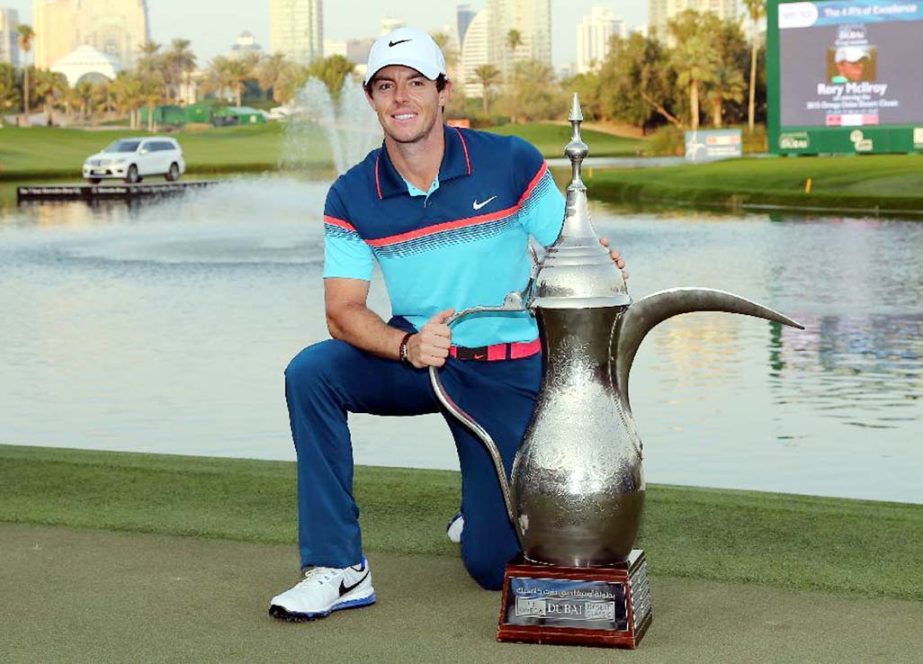 Rory McIlroy of Northern Ireland holds the trophy after he wins the final round of the Dubai Desert Classic golf tournament in United Arab Emirates on Sunday.