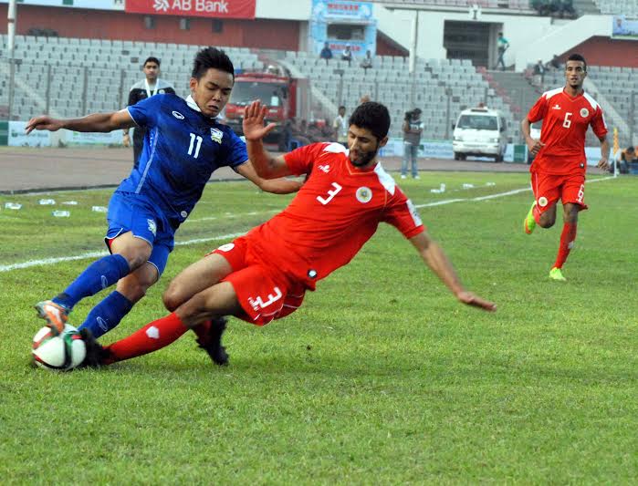 An exciting moment of the match of the Bangabandhu Gold Cup International Football Tournament between Thailand and Bahrain at the Bangabandhu National Stadium on Tuesday. Thailand won the match 3-0.