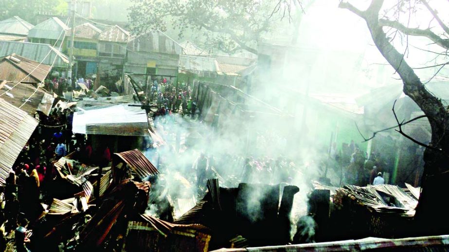 BARISAL: A view of the devastating fire that gutted 31 shops in Agoiljhara Upazila yesterday.