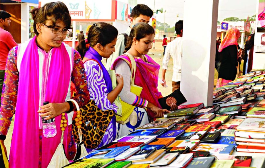 Book-lovers started to rush at Ekushey Boi Mela at Bangla Academy. This photo was taken on Wednesday.