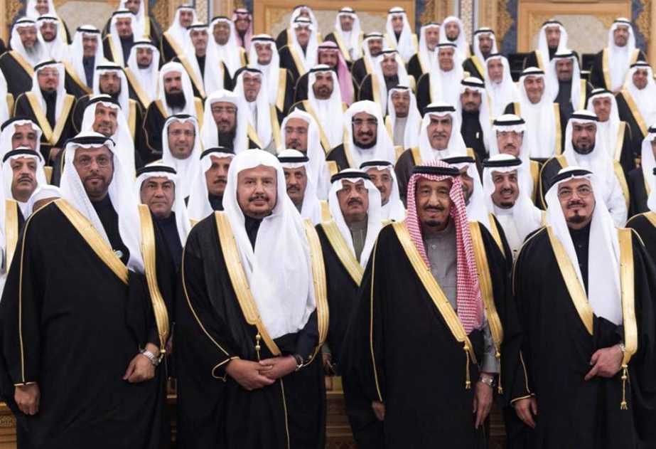 New Saudi Arabian King Prince Salman bin Abdulaziz Al Saud, 2nd right first row, poses with Shura members at consultative Shura Council in Riyadh, Saudi Arabia.