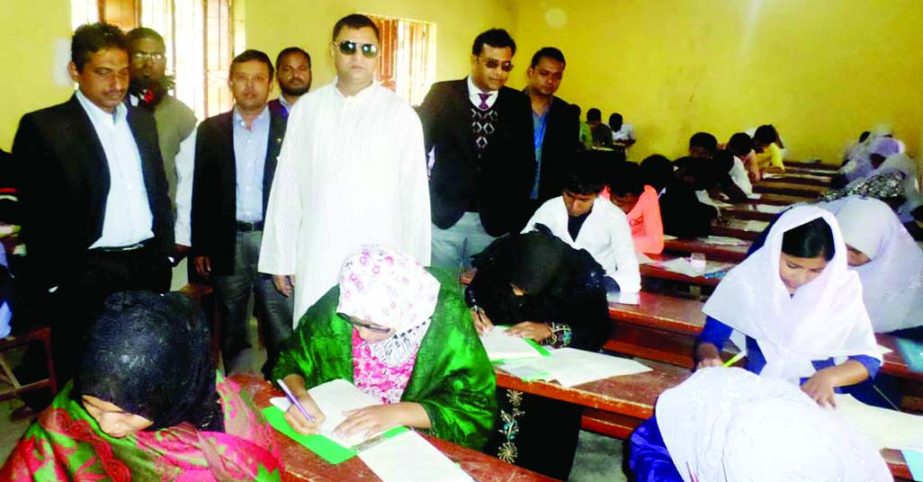 SHERPUR (Bogra): Sherpur upazila Nirbahi Officer inspecting SSC examination hall in Sherpur DJ high school on Friday.