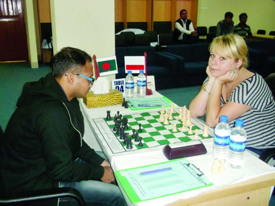 A scene from the 2nd round games of the CJKS-Prime Distributions Group Grandmasters Chess Tournament between Minhaz and WGM Toma Katarzyna of Poland at the M A Aziz Stadium in Chittagong on Friday.