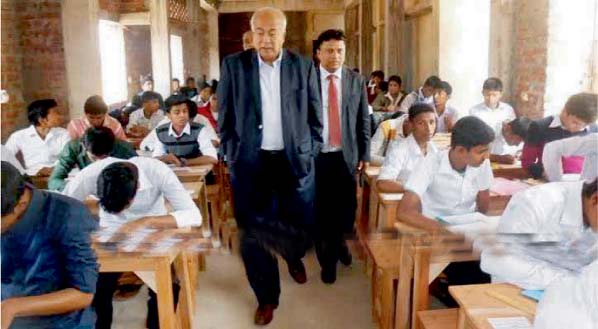 Minister for Housing and Public Works Engr Moshraff Hossain visiting the SSC examination centre in Mirsarai Sadar centre on Friday.