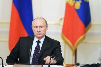 Russian President Vladimir Putin chairs a cabinet meeting outside Moscow.