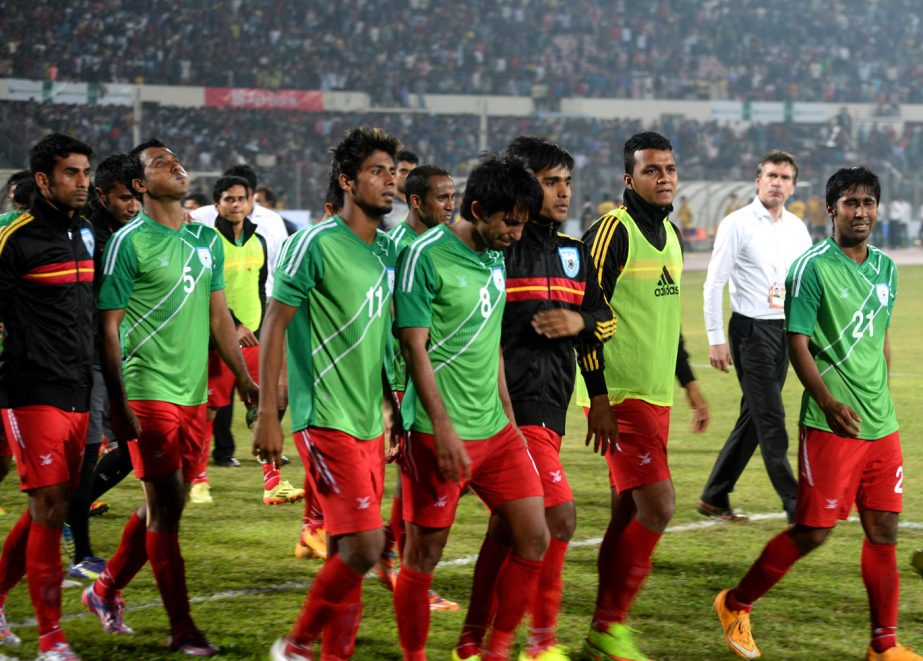 Players of ill-fated Bangladesh National Football team coming out from the field after conceding a 3-2 defeat to Malaysia Football team in the final of the Bangabandhu Gold Cup International Football Tournament at the Bangabandhu National Stadium on Sunda