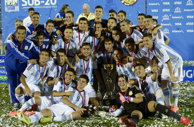 Argentina's players celebrate with the trophy after winning the South America Under-20 championship in Montevideo, Uruguay on Sunday.