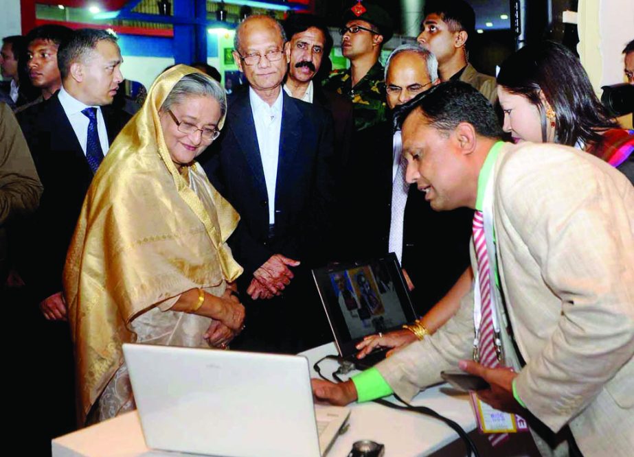 Prime Minister Sheikh Hasina visiting different stalls after inaugurating Digital World -2015 at Bangabandhu International Conference Center in the city on Monday. BSS photo
