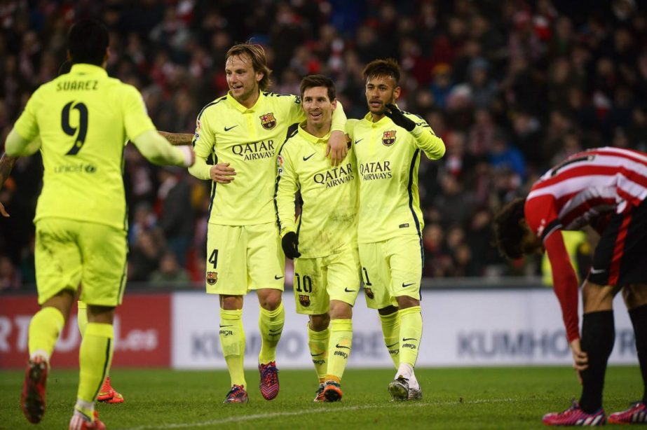 Barcelona's (L-R) Ivan Rakitic, Lionel Messi and Neymar celebrate a goal during their Spanish first division soccer match against Athletic Bilbao at San Mames stadium in Bilbao on Sunday.