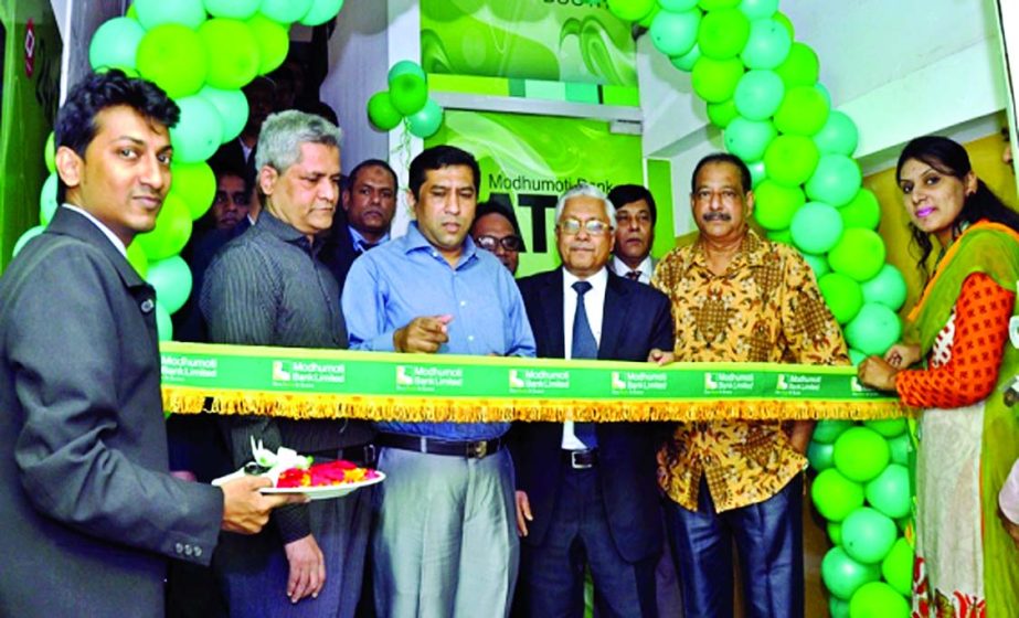 Didarul Alam, MP and Director of Modhumoti Bank Ltd, inaugurating ATM Booth at Agrabad branch, Chittagong on Monday. Md Mizanur Rahman, Managing Director, Md Shaheen Howlader, EVP & Head of Business, Sufi Tofail Ahmed, EVP & Chief Technical Officer, Mokle