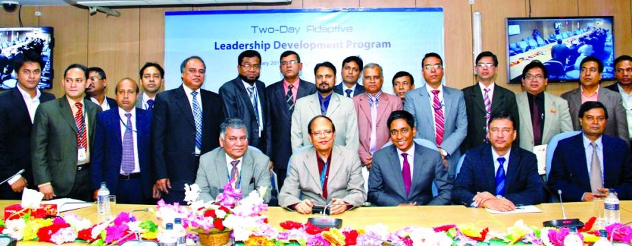 Bangladesh Bank Governor Dr Atiur Rahman poses with the participants of a 2-day long 'Adaptive Leadership Development Workshop" conducted by Ejaj Ahmad, Principal of Ignite Leadership Consulting on Monday.