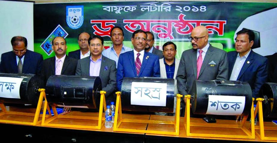 Minister for Road Transport and Bridges Obaidul Quader, Deputy Minister for Youth and Sports Arif Khan Joy and the officials of Bangladesh Football Federation (BFF) taking part at the Draw Ceremony of BFF lottery at the Bangladesh Football Federation Hous