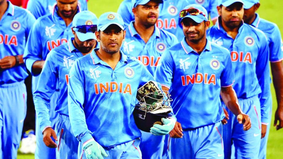 MS Dhoni of India leads the team off the field after the 2015 ICC Cricket World Cup warm-up match between India and Afghanistan at Adelaide Oval on Tuesday in Adelaide, Australia.