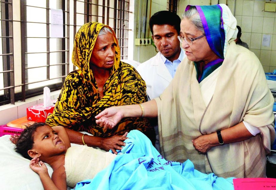 Prime Minister Sheikh Hasina visited the burn unit of Dhaka Medical College Hospital and saw for herself the condition of a two-year-boy, victim of arson attack on Wednesday.