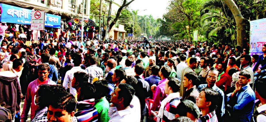 Thousands of people rush to Eskaton Garden in front of Probashi Kalyan Bhaban in city on Thursday to collect Registration form following the recently announcement for jobs in Saudi Arabia.