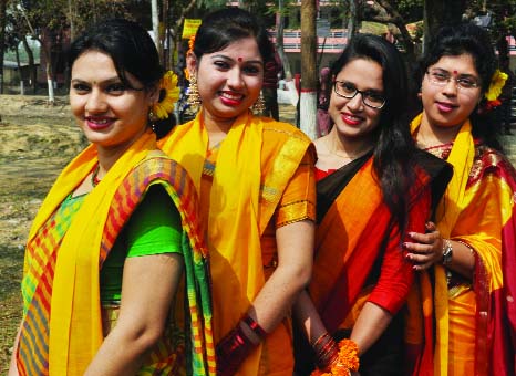 BOGRA: Students of Bogra Govt Azizul Haq University College dressed in red-bordered yellow sharees welcoming Pahela Falgun, on the first day of Spring in the Bangla calendar yesterday.