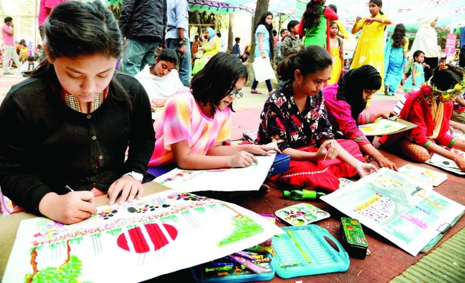 Children are engrossed in painting at a drawing competition organized on the occasion of Amar Ekushey and International Mother Language Day by Mainia Shishu Kishore Mela at TSC Island of Dhaka University on Friday.