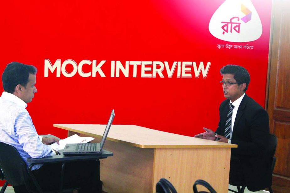 Picture shows a Mock Job Interview taking by a Robi officer of a fresher graduate at Job Fair at Dhaka University organized by ACCA recently.