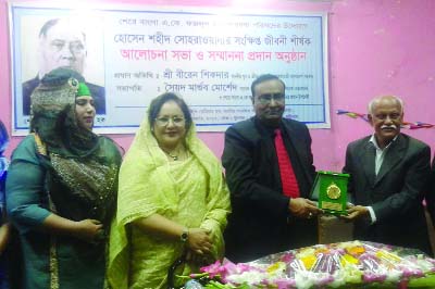 RAJBARI: Alhaj Akbar Ali, Administrator, Rajbari Zilla Parishad receiving Hossain Shaheed Shawardhy Gold Medal as the best district administrator at VIP Hall room of Public Library in Dhaka organised by Sher-e- Bangla Fazlul Haqur Research Parishad