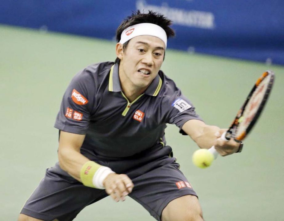 Kei Nishikori of Japan reaches for a shot against Austin Krajicek of the United States in a quarterfinal at the Memphis Open tennis tournament on Friday in Memphis.
