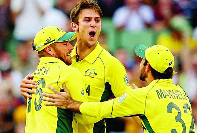 Mitchell Marsh exults after removing Gary Ballance during the 2015 ICC Cricket World Cup match between England and Australia at Melbourne Cricket Ground on Saturday. Internet photo