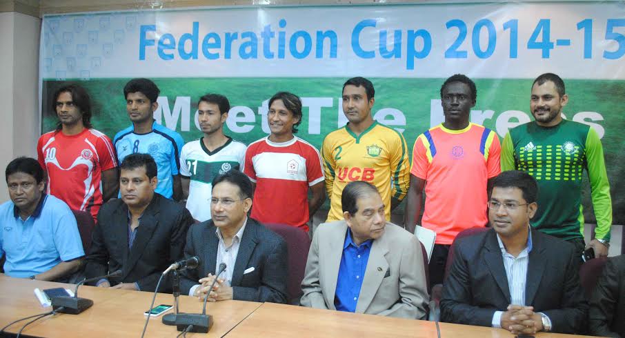 Captains of the participating teams of the Federation Cup and officials of Bangladesh Football Federation (BFF) pose for a photograph at the BFF House on Sunday.