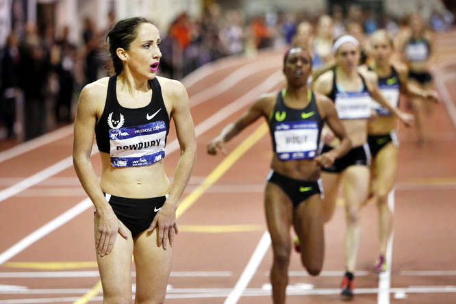 Shannon Rowbury (left) reacts after crossing the finish line ahead of the field in the women's Wanamaker Mile during the Millrose Games track and field meet on Saturday in New York. Rowbury won the race with a time of 4:24.32.