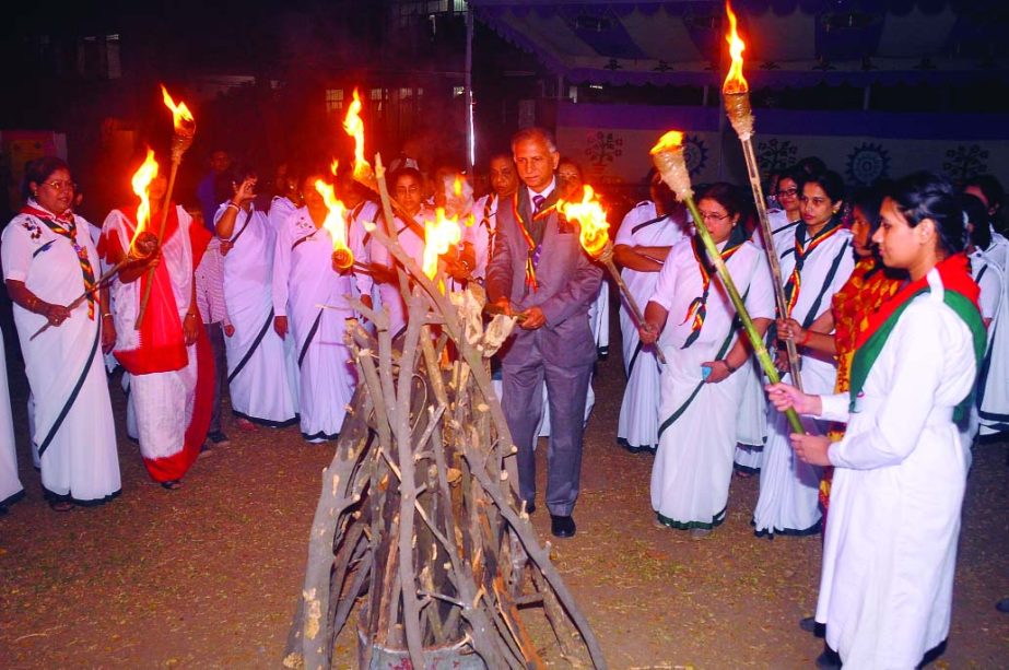 Dhaka University Vice-Chancellor Prof Dr AAMS Arefin Siddique is seen with others inaugurating the University Rangers Camp Fire Unit as chief guest at Rokeya Hall Compound on Sunday.