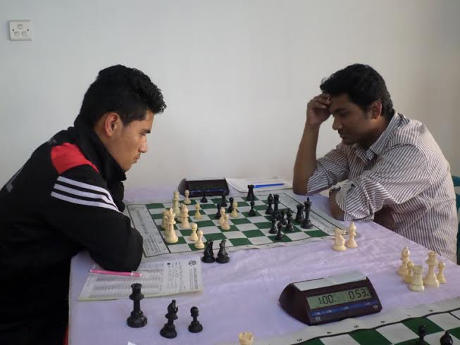 A scene from the 2nd round games of the Shahid Sheikh Moni Memorial International Rating Chess Tournament 2015 between Lama Himal of Nepal and IM Abu Sufian Shakil of Dhaka Mohammedan at NSC Tower Auditorium Lounge of National Sports Council on Monday.