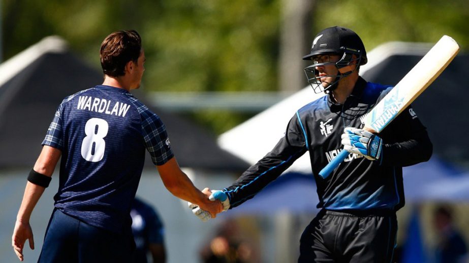 Daniel Vettori shakes hands with Iain Wardlaw after hitting the winning runs during the ICC Cricket World Cup match between New Zealand and Scotland at University Oval on Tuesday in Dunedin, New Zealand.