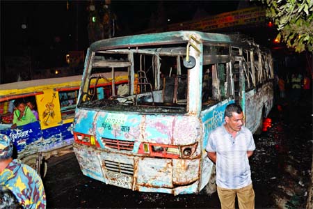 Hartal supporters torched a bus opposite Bahadur Shah Park in the city on Tuesday evening.