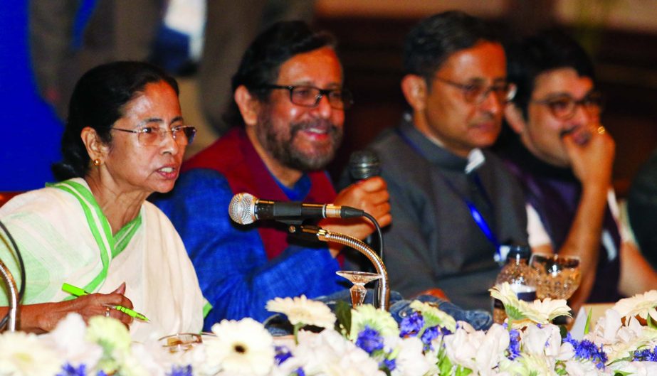 West Bengal Chief Minister Mamata Banerjee exchanging views with businessmen, litterateurs and cultural personalities of both countries at Hotel Sonargaon in city on Friday.