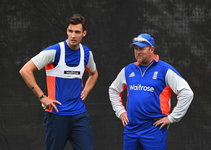 Steven Finn plots a better bowling performance with David Saker, at Christchurch on Sunday.