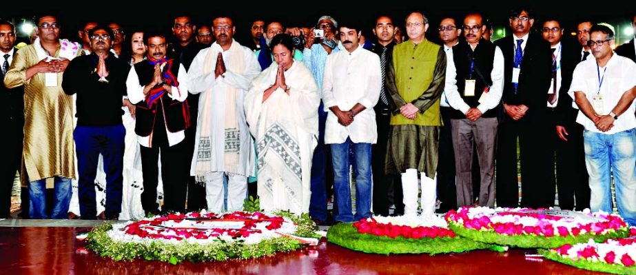 Chief Minister of West Bengal Mamata Benarjee paying respect to Language Martyrs after placing wreaths at the altar of Central Shaheed Minar marking the Amar Ekushey on Saturday.