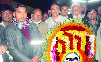 SHARIATPUR: Leaders of Shariatpur District Jatiyo Party placing wreaths at Central Shaheed Minar in Shariatpur to mark the International Mother Language Day on Saturday.