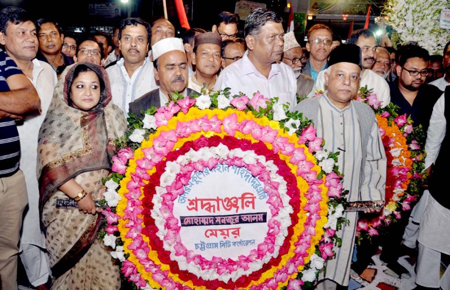 CCC Mayor M Monzur Alam placing wreaths at the Central Shaheed Minar in Ctg on the occasion of Amar Ekushey and the International Mother Language Day on Saturday.